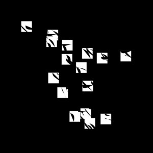 White squares containing the glyphs are scattered over a black background.